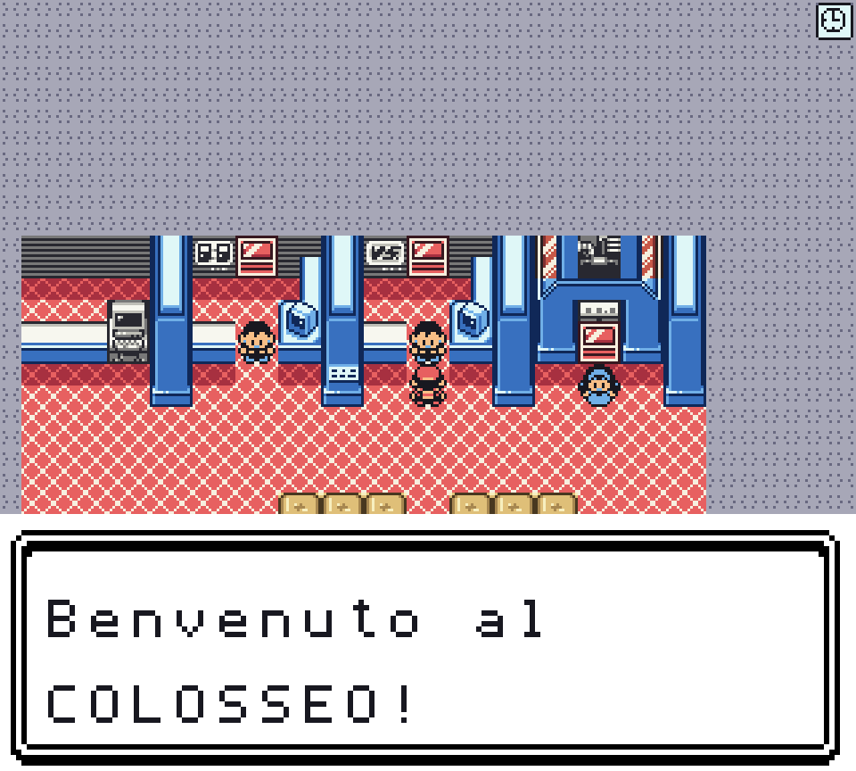 Il piano di sopra del Centro Pokémon, con i banconi delle addette, e la textbox «Benvenuto al COLOSSEO!»